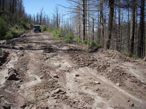 7-06-14-where-water,-rocks-and-mud-ran-down-the-road-3