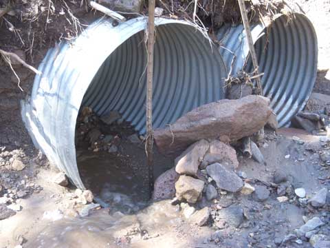 Culverts before Andy removed the rocks. 