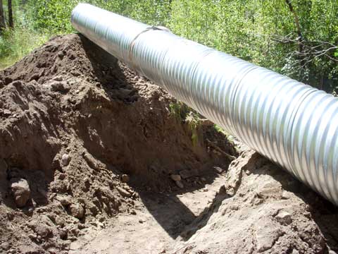 9-10-15-Installing-Culvert-on-Woodcutter's-Road-1